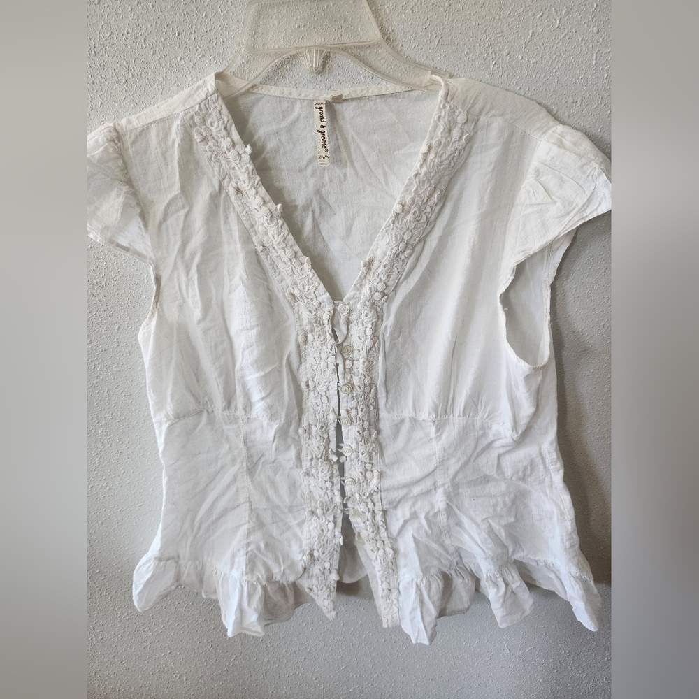 White 100% cotton lace trim and ruffled edge blouse.  Size L
